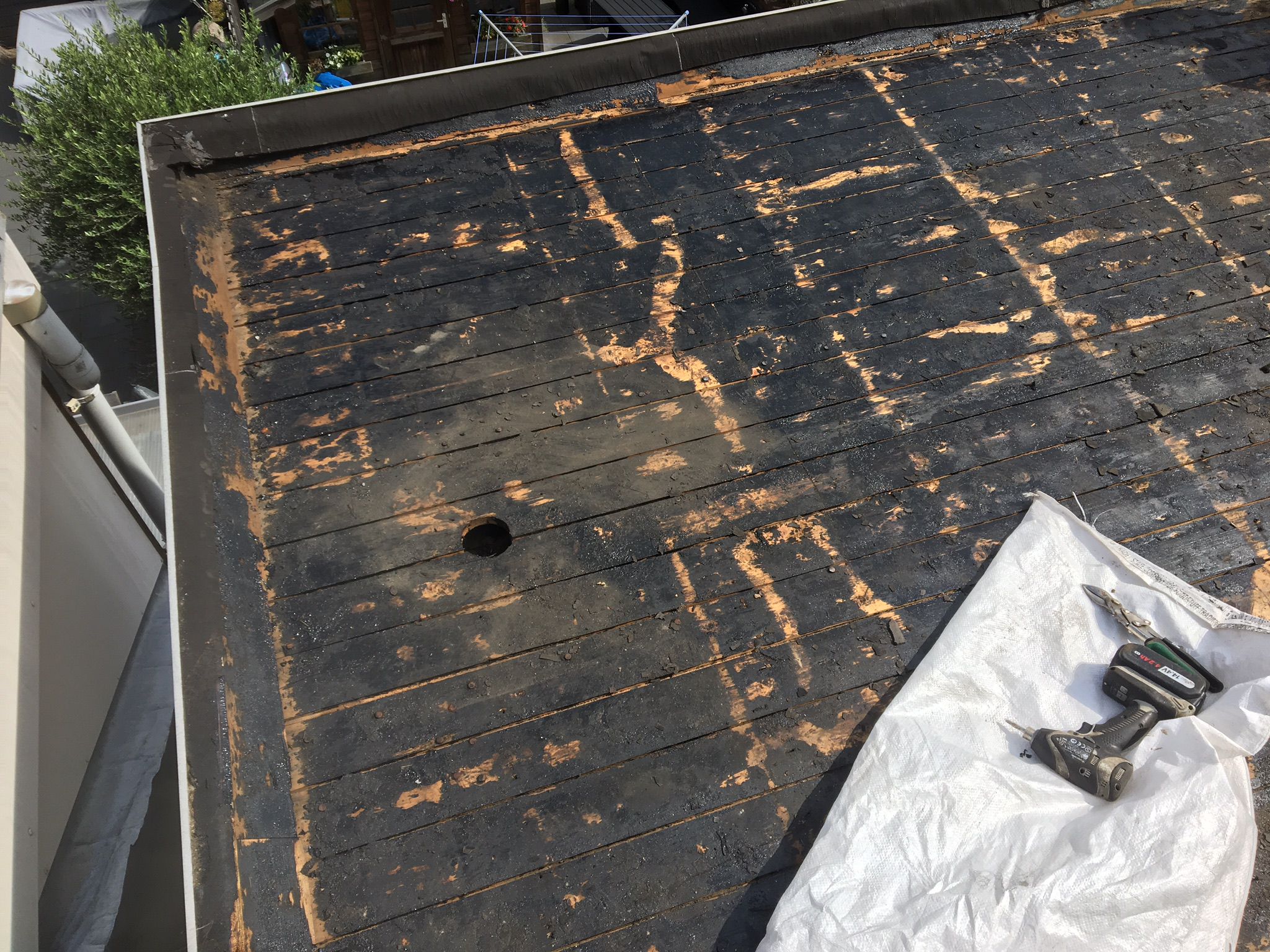 Aanbrengen nieuwe dakpannen, tengels, panlatten en dampdoorlatende folie foto 48