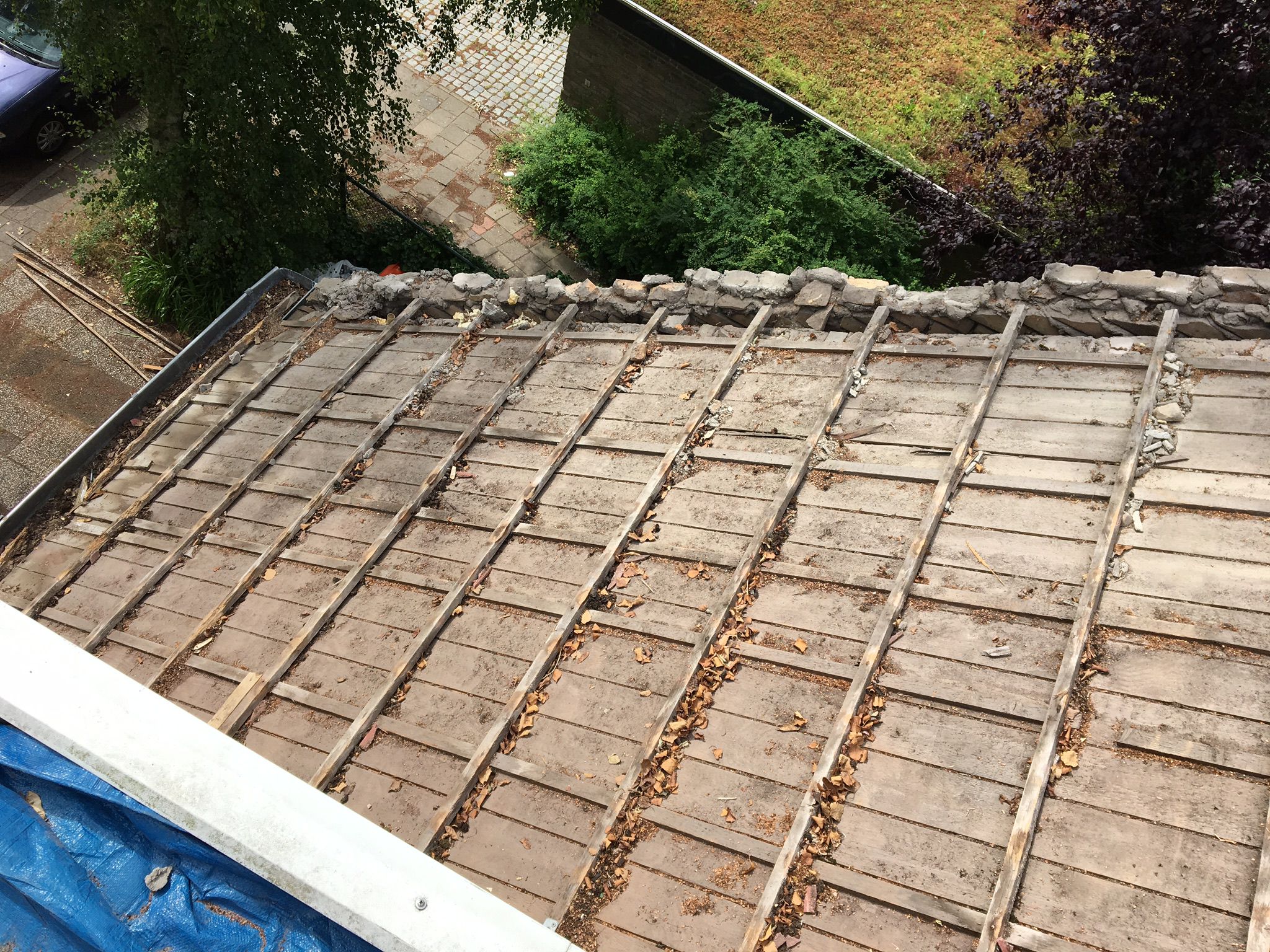 Aanbrengen nieuwe dakpannen, tengels, panlatten en dampdoorlatende folie foto 61
