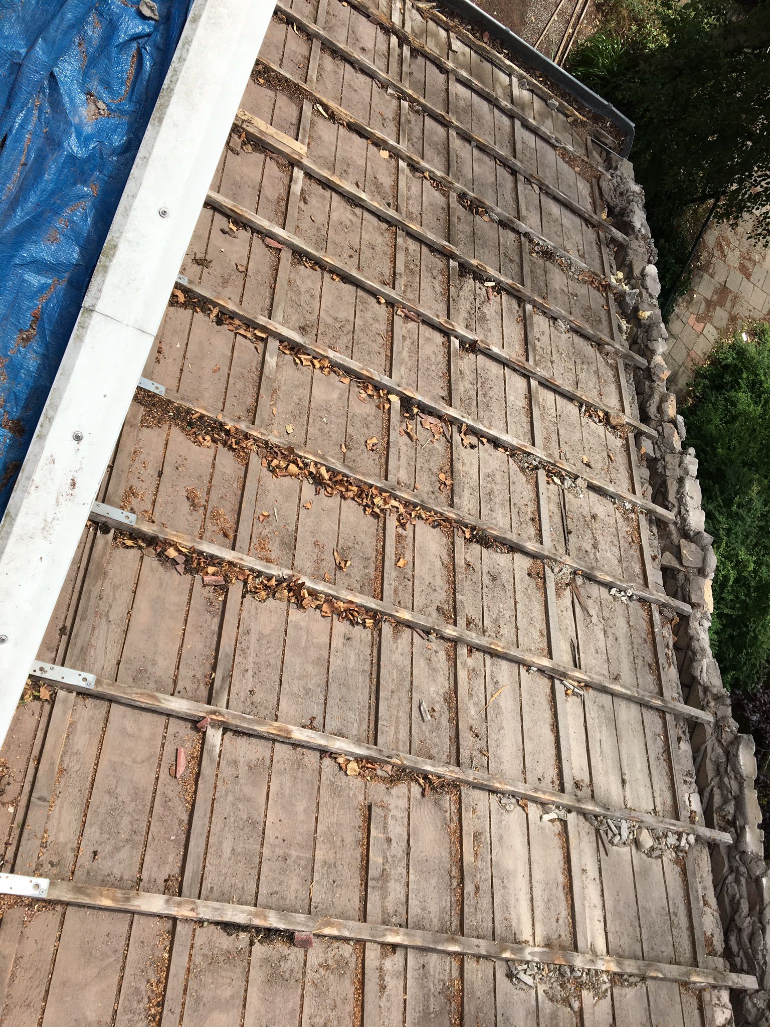 Aanbrengen nieuwe dakpannen, tengels, panlatten en dampdoorlatende folie foto 62
