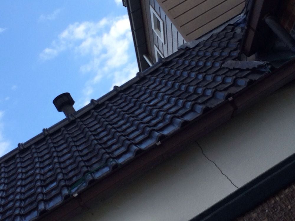 Aanbrengen nieuwe dakpannen, tengels, panlatten en dampdoorlatende folie foto 1